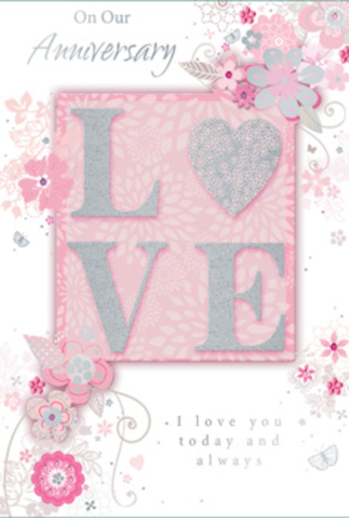The photograph features an anniversary card opened out slightly, inviting a lingering look at its romantic, garden-inspired design that feels right at home in tranquil corners of Weybridge. The main motif is the word LOVE showcased in the centre, each letter rendered in an elegant, frosted glitter that catches the light much like sun on a vase of fresh roses. The raised texture promises a pleasant, tactile experience, with the gentle sparkle suggesting celebration without overwhelming the eye. Around this central word, wispy, hand-drawn blooms and soft sprays of foliage drift gracefully towards the edges of the card. Their colours-muted pinks, hints of lilac, and creamy ivory-blend together in perfect harmony, reminiscent of a pastel bouquet placed on a windowsill overlooking the River Wey. Delicate flourishes thread in and out of the flowers: sweeping filigree lines, tiny leaves, and almost-hidden butterfly motifs that seem to be fluttering quietly between the petals. These small details add a sense of gentle movement and lift, as though a light breeze has just passed across a freshly arranged display. The primary message, reading I love you today and always, is printed in graceful, understated type that sits calmly beneath the floral artwork, inviting a pause for gratitude and reflection. The layout is carefully balanced so that no corner feels empty, yet the design never appears crowded. Overall, the card has the feeling of a hand-tied bouquet translated into paper-a soft, heartfelt piece that would pair beautifully with anniversary flowers delivered to a cosy home near Weybridge Green.