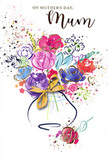 Radiant Mother's Day card illustration presenting a joyful burst of watercolour flowers, as if a fresh spring bouquet from a Weybridge florist had been translated into paint. Lush purples, playful pinks, serene blues, and touches of radiant red bloom together at the centre, their loosely defined petals overlapping in a soft haze of colour. Fine lines of shining gold trace some of the edges, picking out curves and contours like sunlight slipping through leaves in a quiet garden off Heath Road. The bouquet sits in a gently curved vase at the bottom of the design, its form rendered in pale, translucent washes that suggest glass or polished ceramic. Around its neck rests an elegant golden bow, evoking the reassuring rustle of ribbon being tied before a bouquet is delivered to a waiting doorstep. All around the main arrangement, flecks and splashes of colour scatter across the bright white card, much like petals tossed in celebration at a family gathering. Small heart shapes and subtle splatters at the margins lend a playful, festive air without distracting from the central flowers. The overall composition feels light yet heartfelt, a balance of spontaneity and care, echoing the way a florist thoughtfully places each stem to convey meaning. This card visually expresses gratitude, admiration, and tenderness, making it an ideal choice for honouring a beloved mum in Weybridge with an image that carries the warmth and joy of a hand-delivered bouquet.